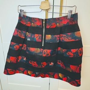 REVERSIBLE PLUS SIZE PLEATED MINI SKIRT